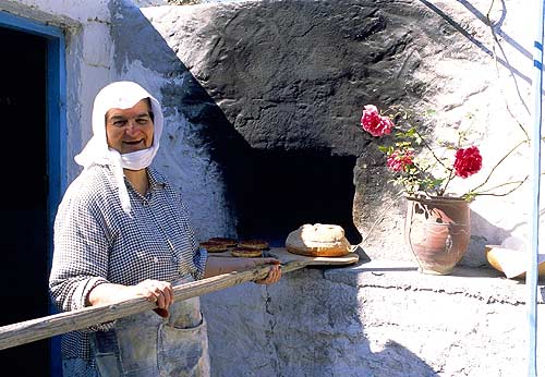 OLD WOMAN AND OVEN - 