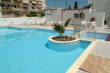 Enjoy the sun of Greece next to the swimming pool of hotel Kontia CLICK TO ENLARGE