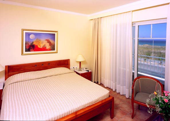 Image of bedroom of suite, Pelagos Suites Hotel, Kos Greece. CLICK TO ENLARGE