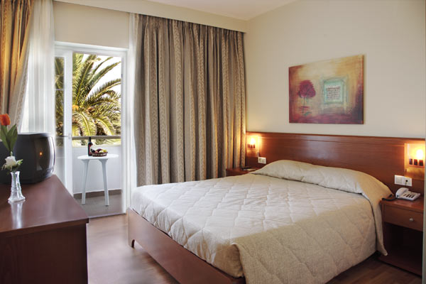 Inside view of room with two beds of Sandy Beach Hotel, located at Marmari village. CLICK TO ENLARGE